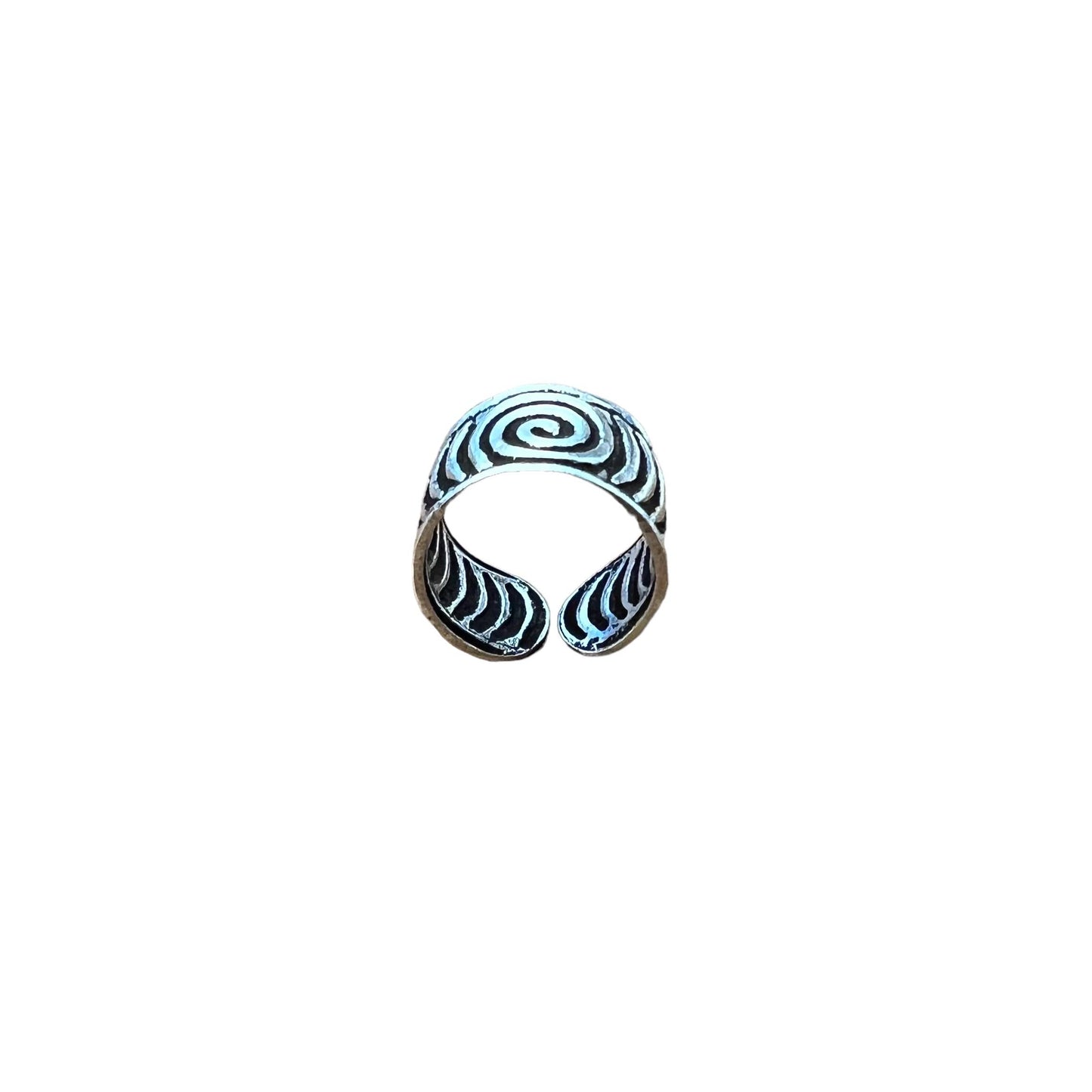 Crescent moon-shaped ring with black and white pattern on a white background