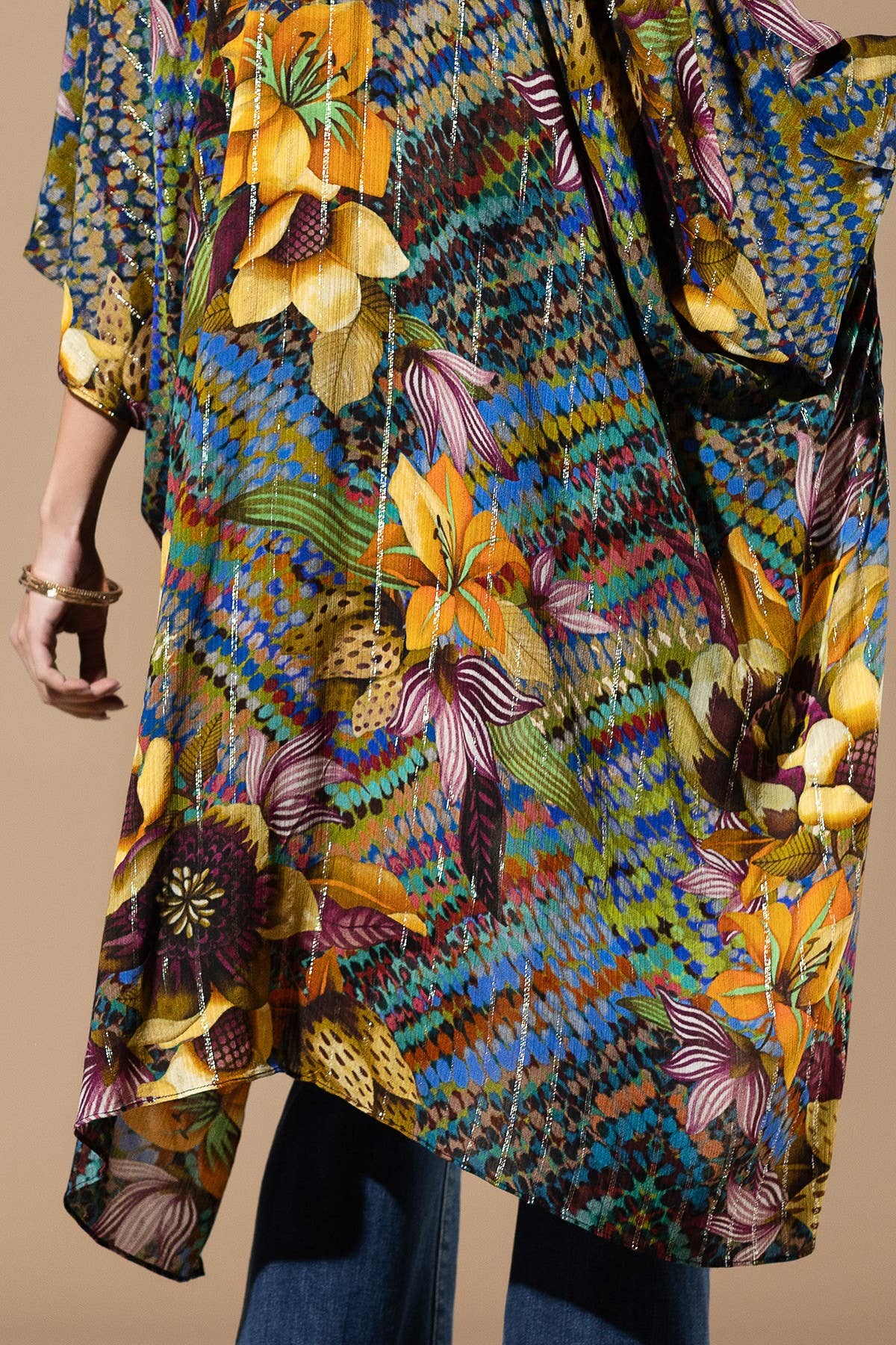 Colorful floral patterned dress with a neutral background
