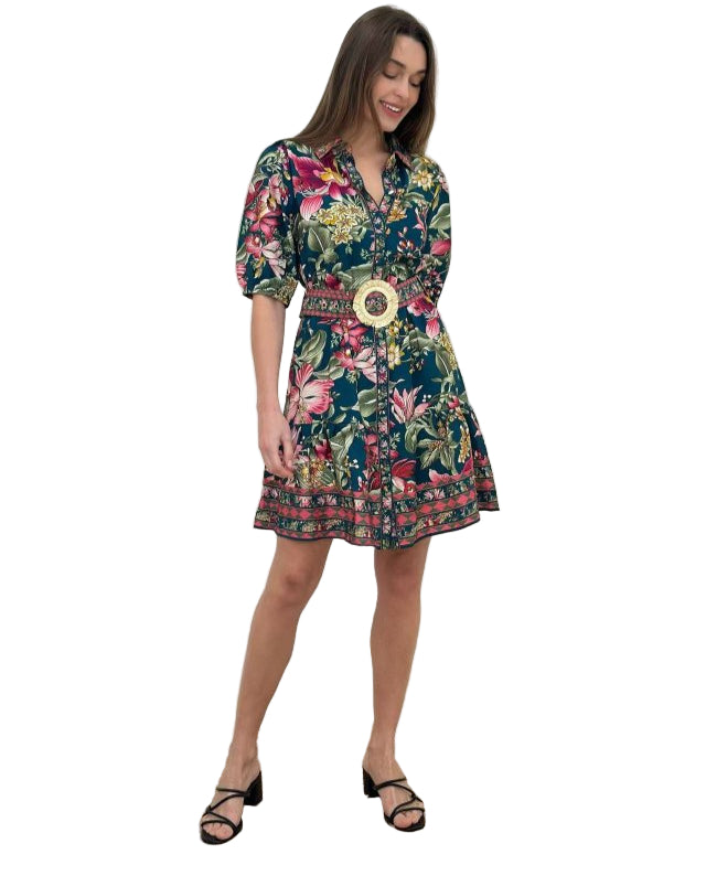 Woman wearing a floral dress on a white background