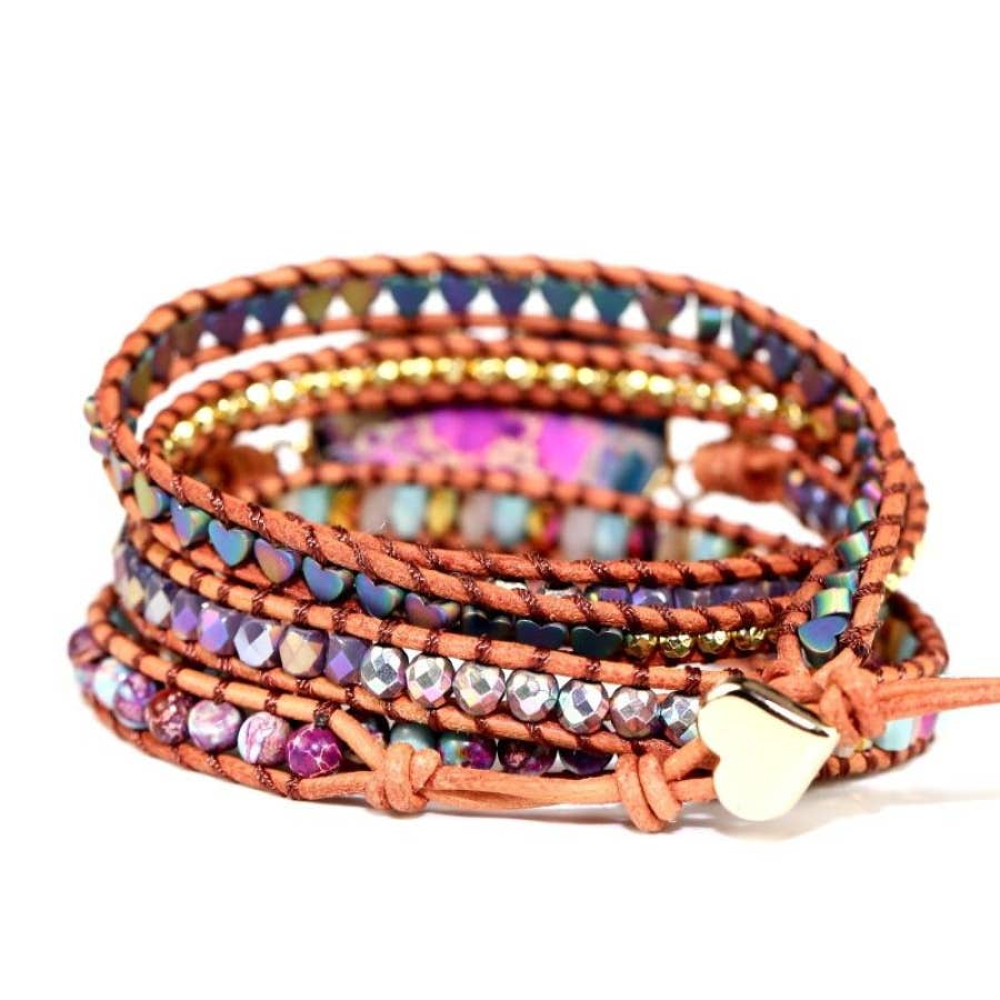 Multicolored beaded wrap bracelet with a heart charm on a white background