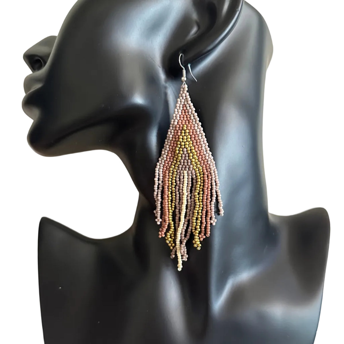 A long beaded tassel earring displayed on a black mannequin bust. The earring features a triangular cluster of small beads in pink, yellow, and green, with multiple strands of dangling beads below.