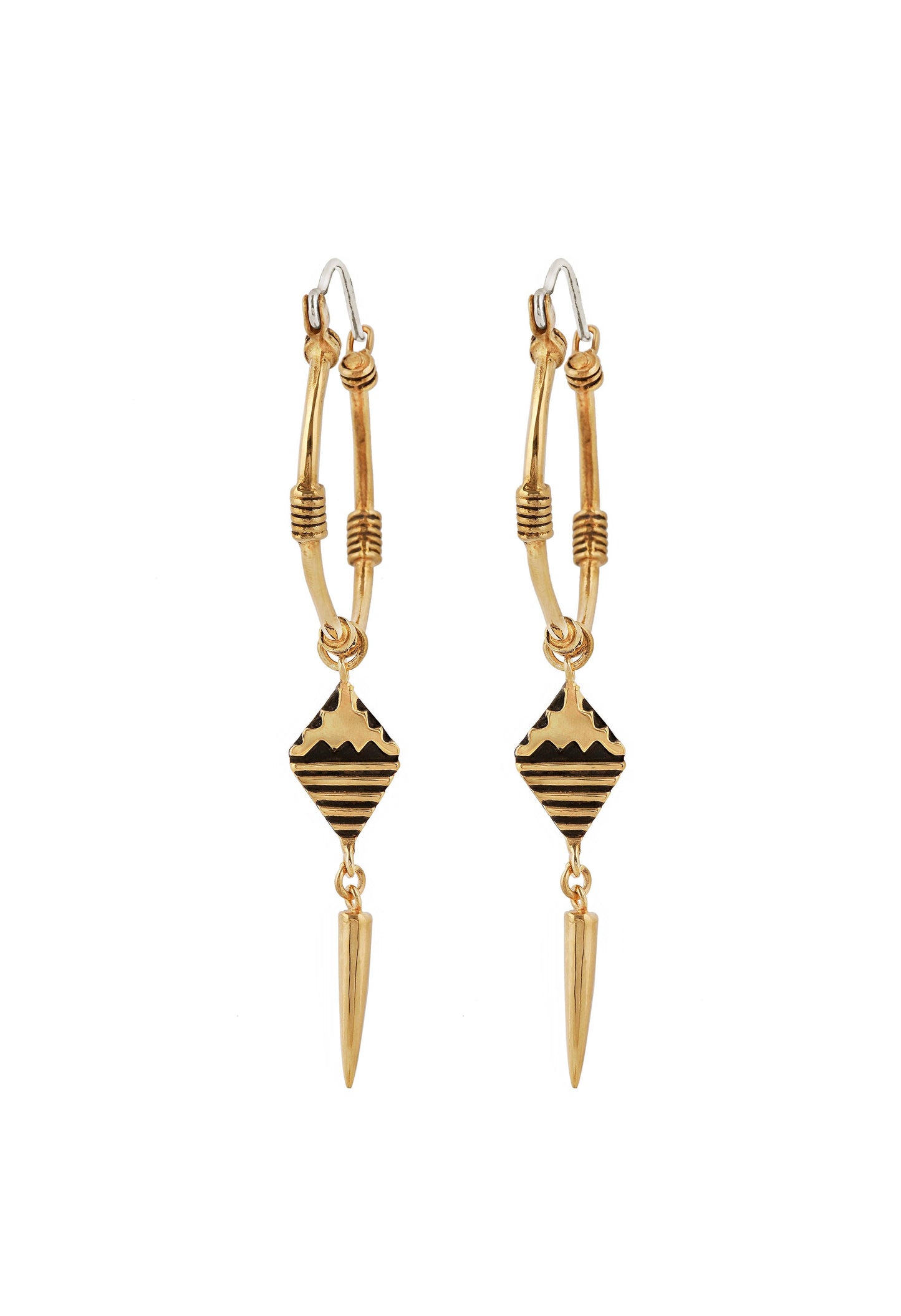 Gold and black earrings on a white background