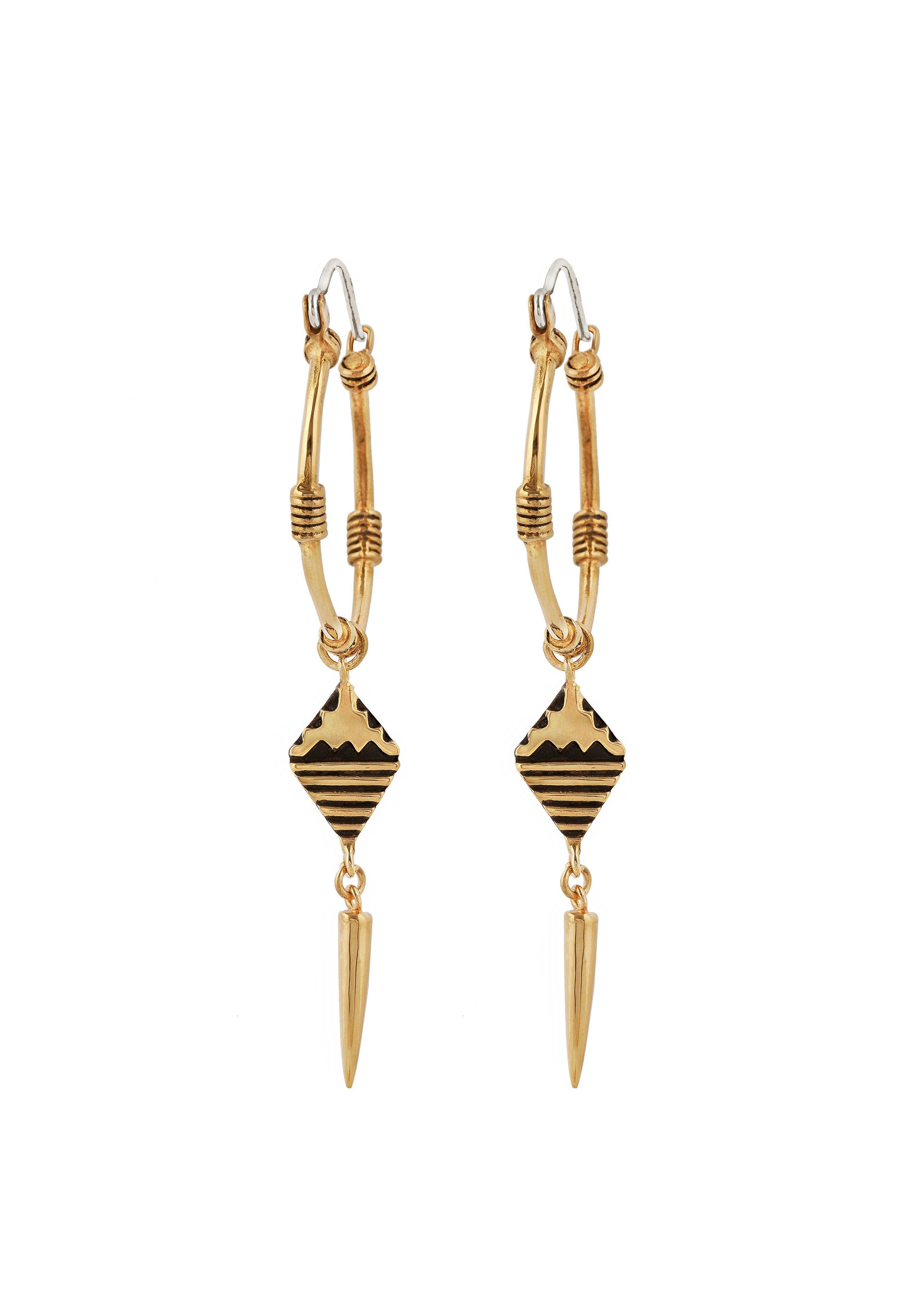 Gold and black earrings on a white background