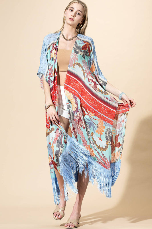 Woman wearing a colorful kimono-style garment on a beige background
