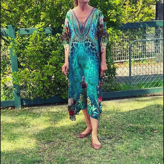 Women modelling a green teal kaftan