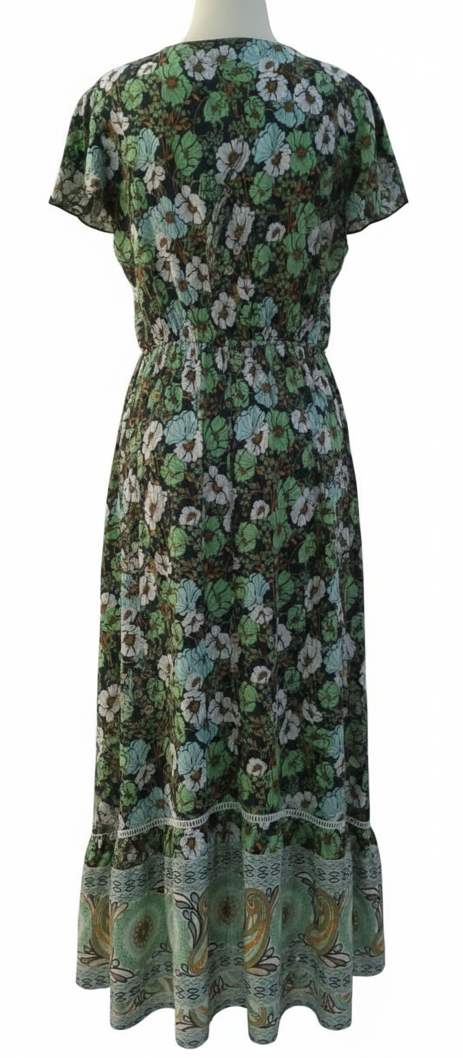 Floral patterned dress on a mannequin against a white background